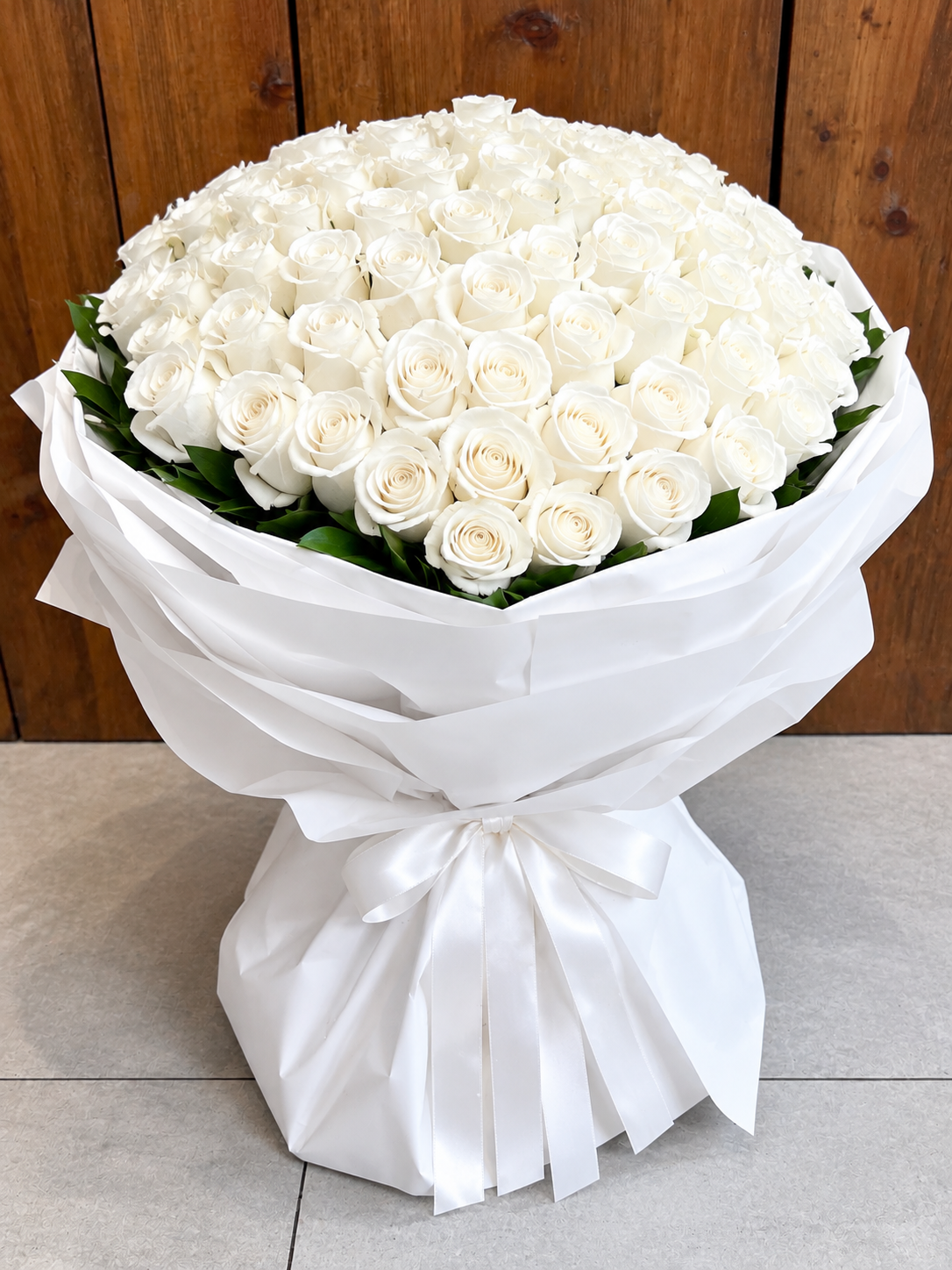 300 White Roses Bouquet in White Wrap